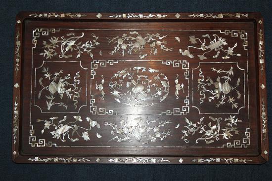 A Chinese rosewood and mother of pearl inlaid rectangular tray, late 19th century, 56 x 34cm